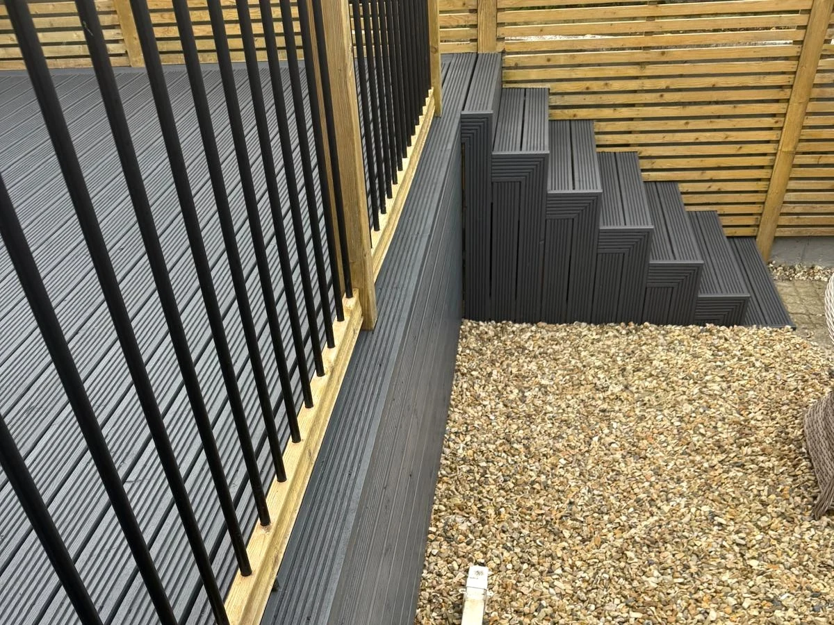 deck-installation-gray-composite-decking-steps-with-fence-swansea-daffodil-decor deck installation gray composite decking steps with fence swansea daffodil decor