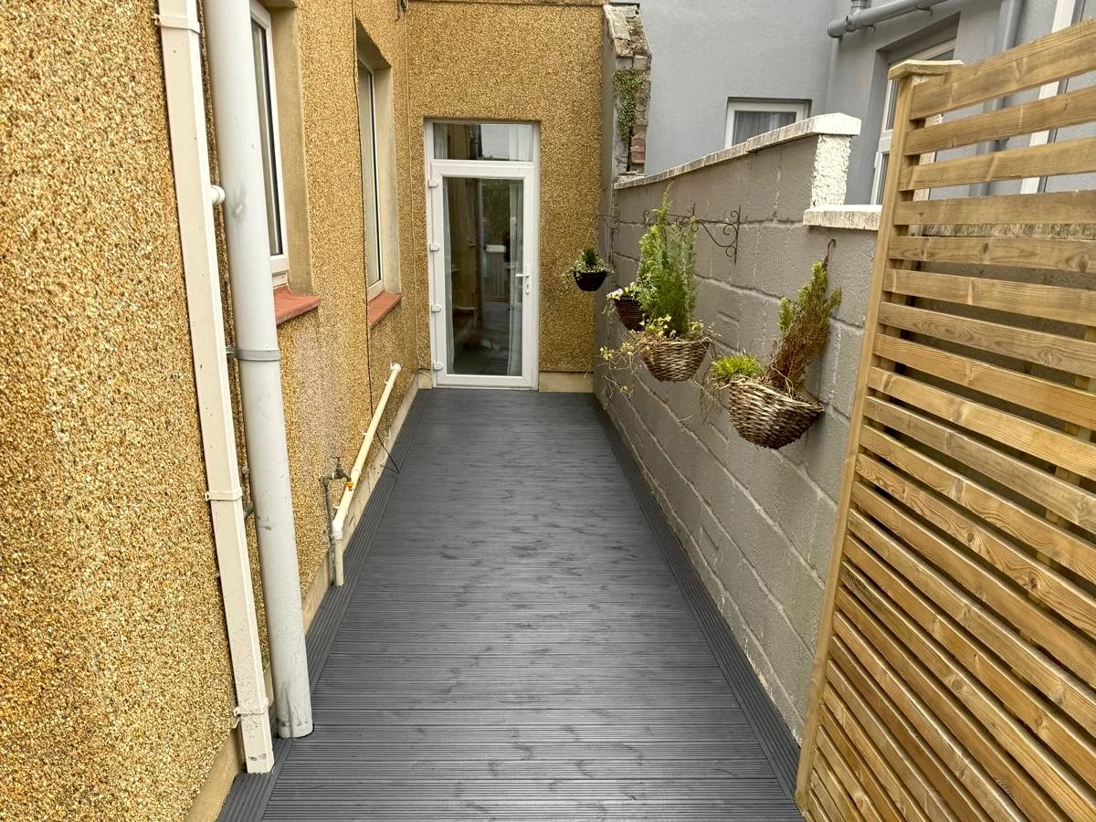 deck installation gray composite decking steps worker swansea daffodil decor