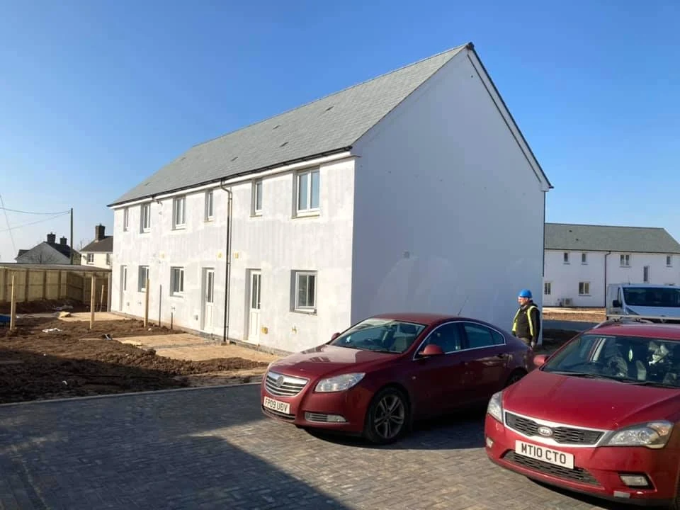 White-painted modern new-build house exterior in Swansea
