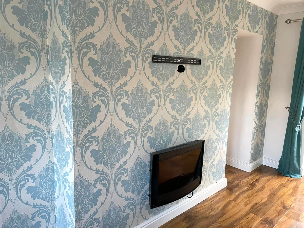 living room painting blue damask wallpaper feature wall swansea daffodil decor 1
