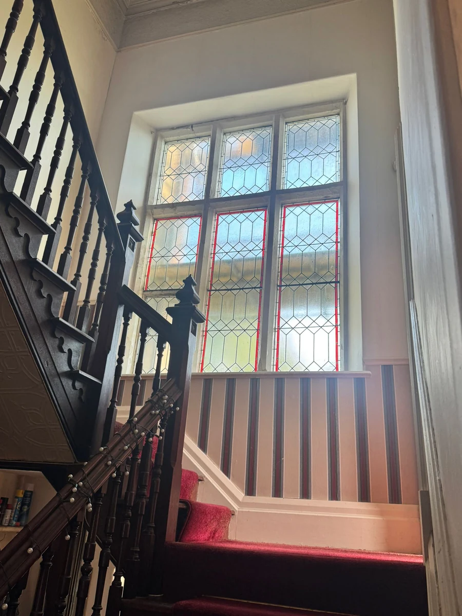 Period staircase hall freshly repainted, Swansea