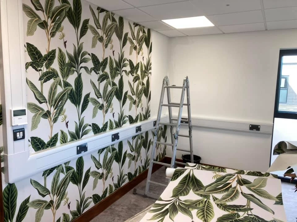 wallpapering dark floral feature wall bedroom swansea daffodil decor 3