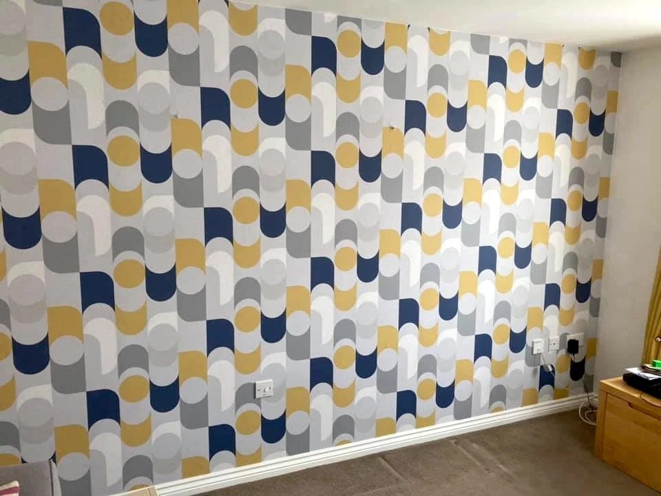 wallpapering geometric circles pattern feature wall bedroom swansea daffodil decor 1